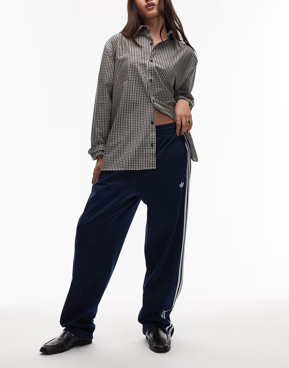 ASOS adidas Originals Firebird track pants in navy