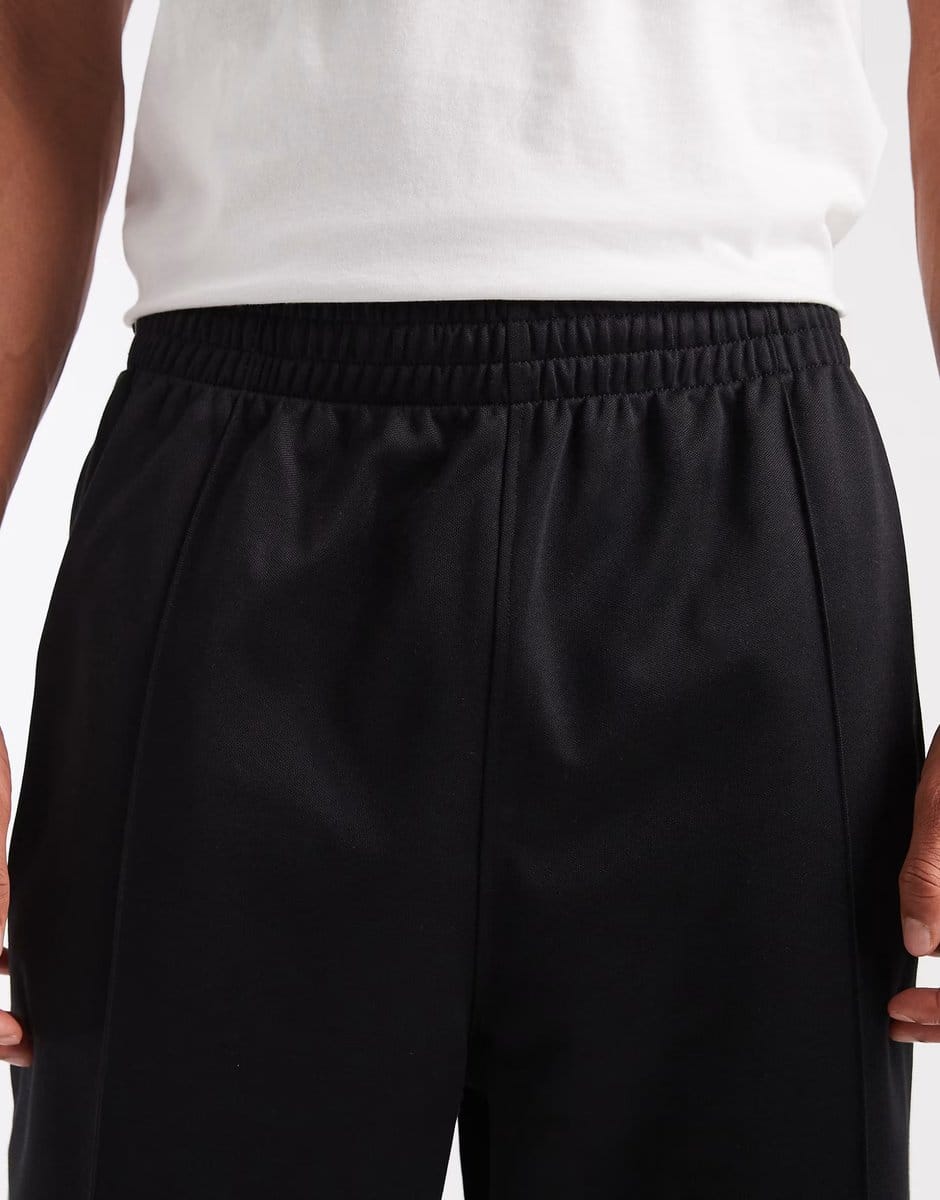 ASOS adidas Originals Baggy track pants in black / white - 4