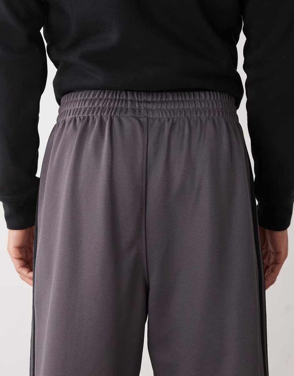 ASOS adidas Originals Firebird baggy fit track pants in grey and black - 4