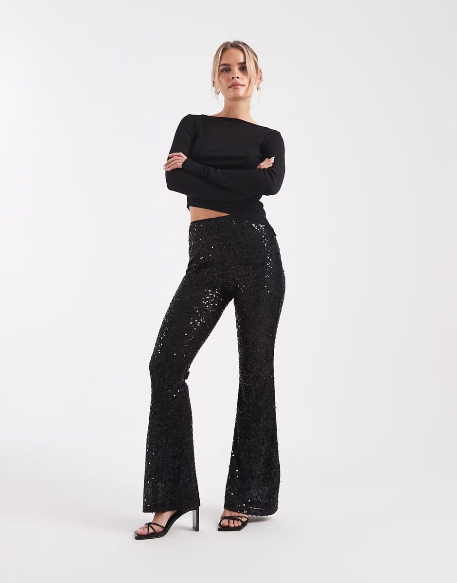 ASOS ASOS DESIGN Petite wiggle sequin sheer mesh flare trouser in black - 1