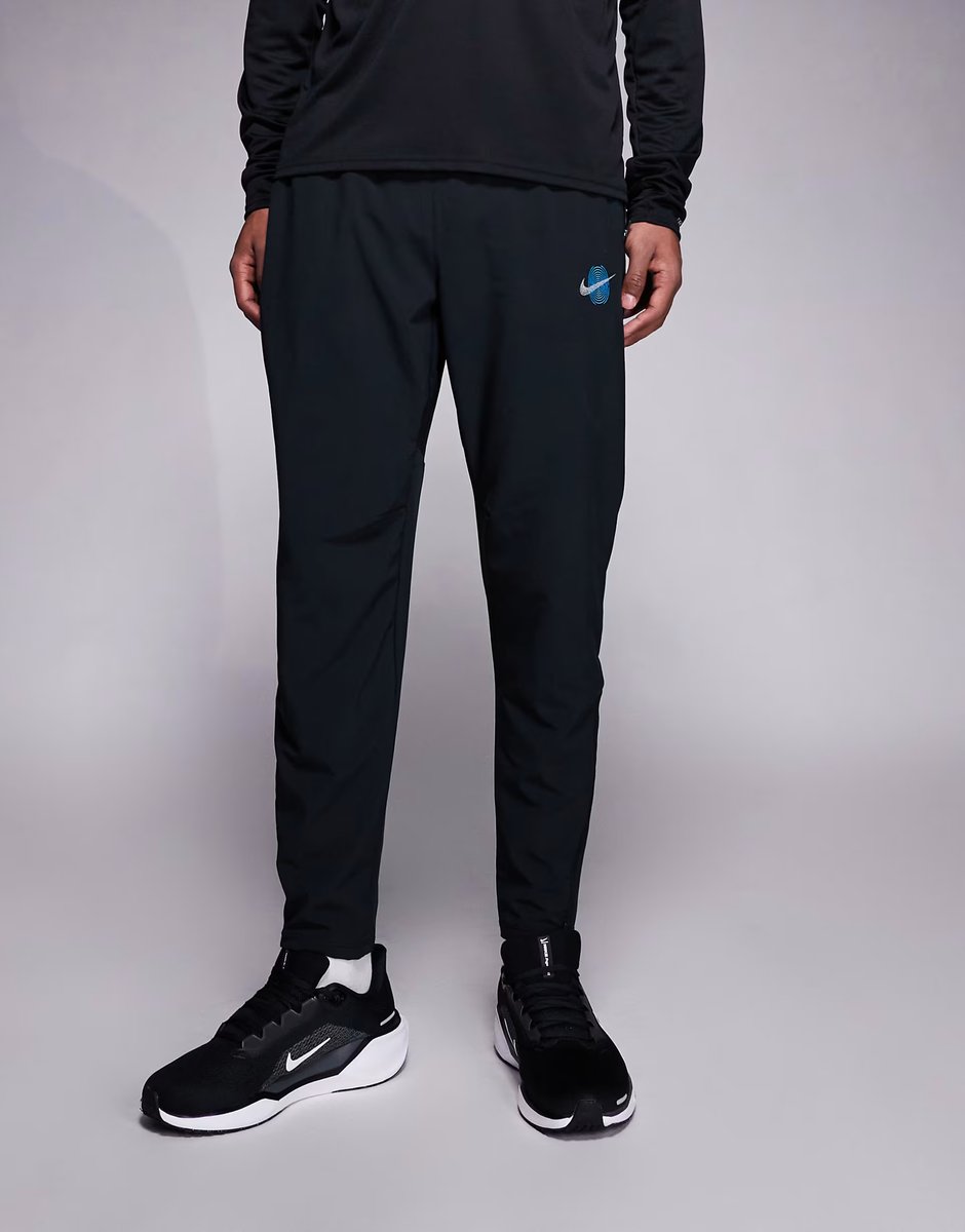 ASOS Nike Running Stride Dri-FIT woven trousers in black - 1
