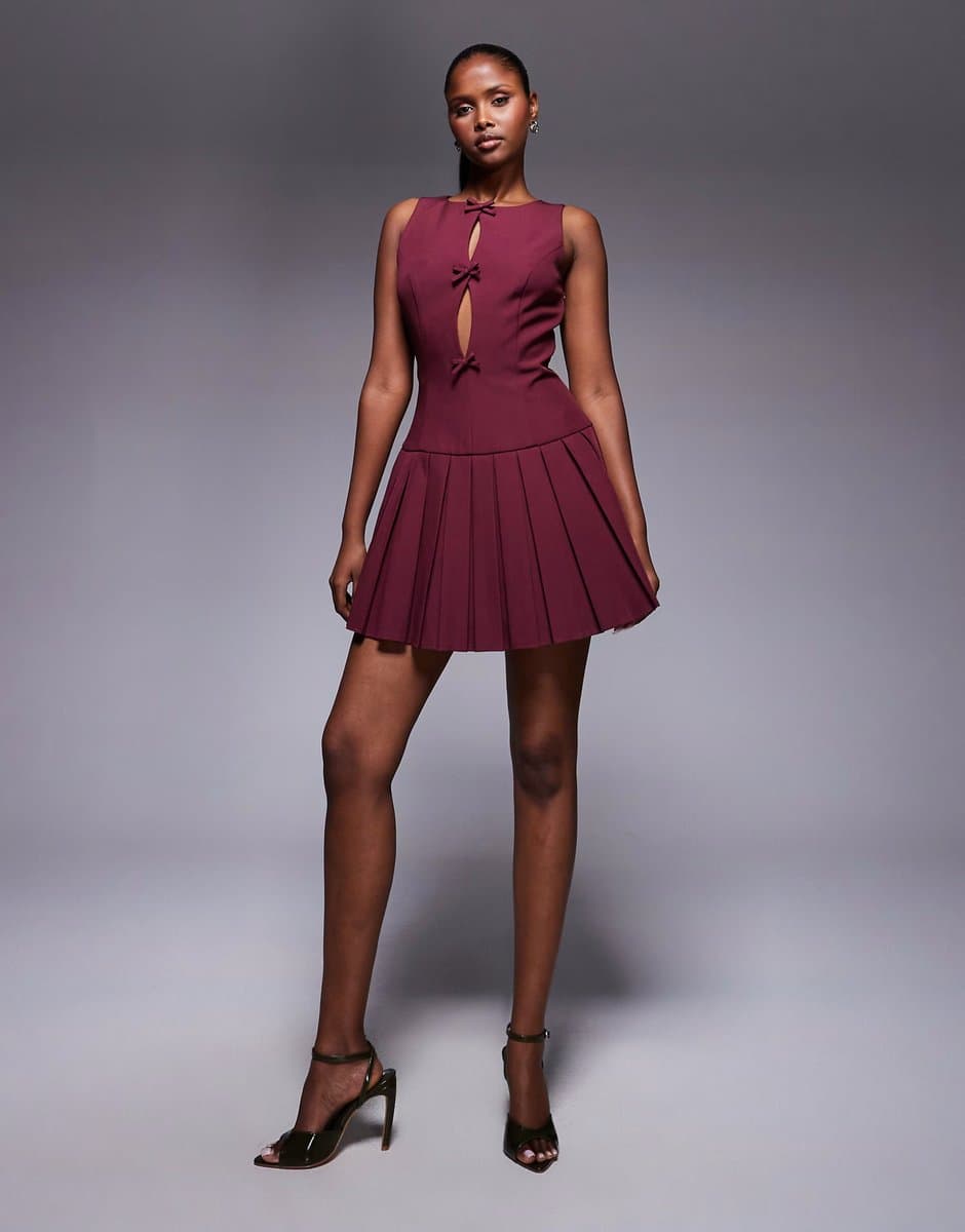 ASOS Kaiia exclusive cut out bow detail pleated skirt mini dress in burgundy