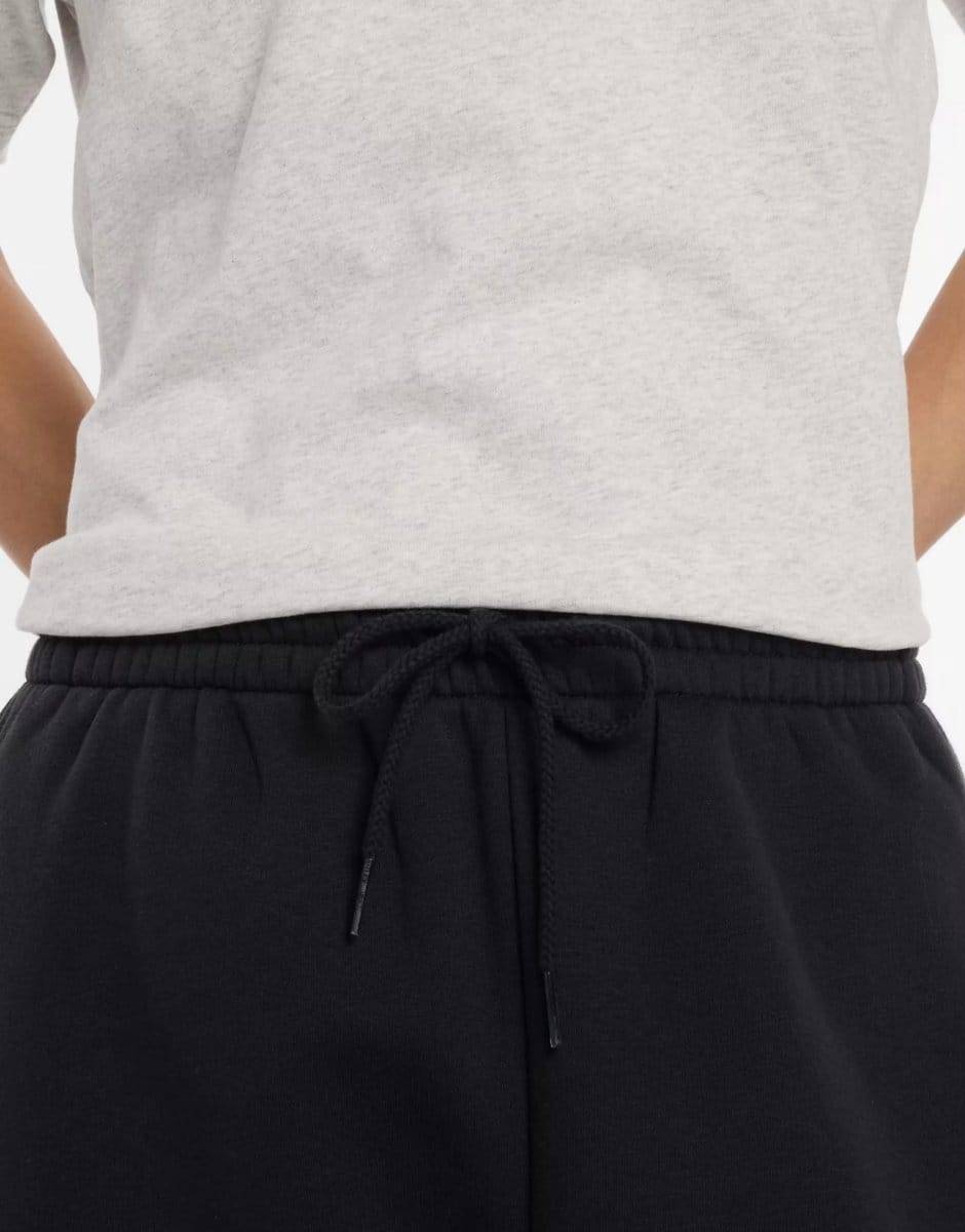 ASOS New Balance Linear graphic fleece pant in black - 4