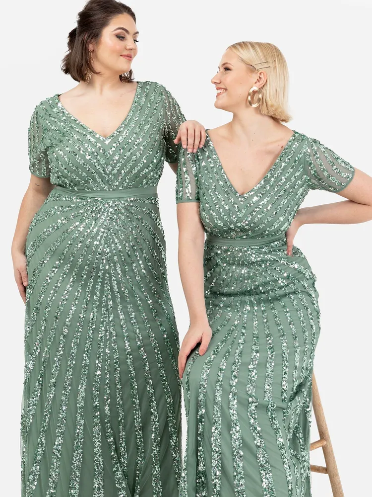 Monsoon Romy sage-green chiffon maxi dress with cascading side ruffles and a thigh split — the brand's romantic wedding-guest look
