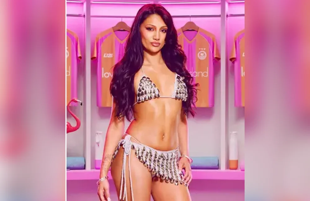 Jasmine Müller in a silver metallic scale bikini and matching fringe wrap skirt in the official Love Island 2026 dressing room