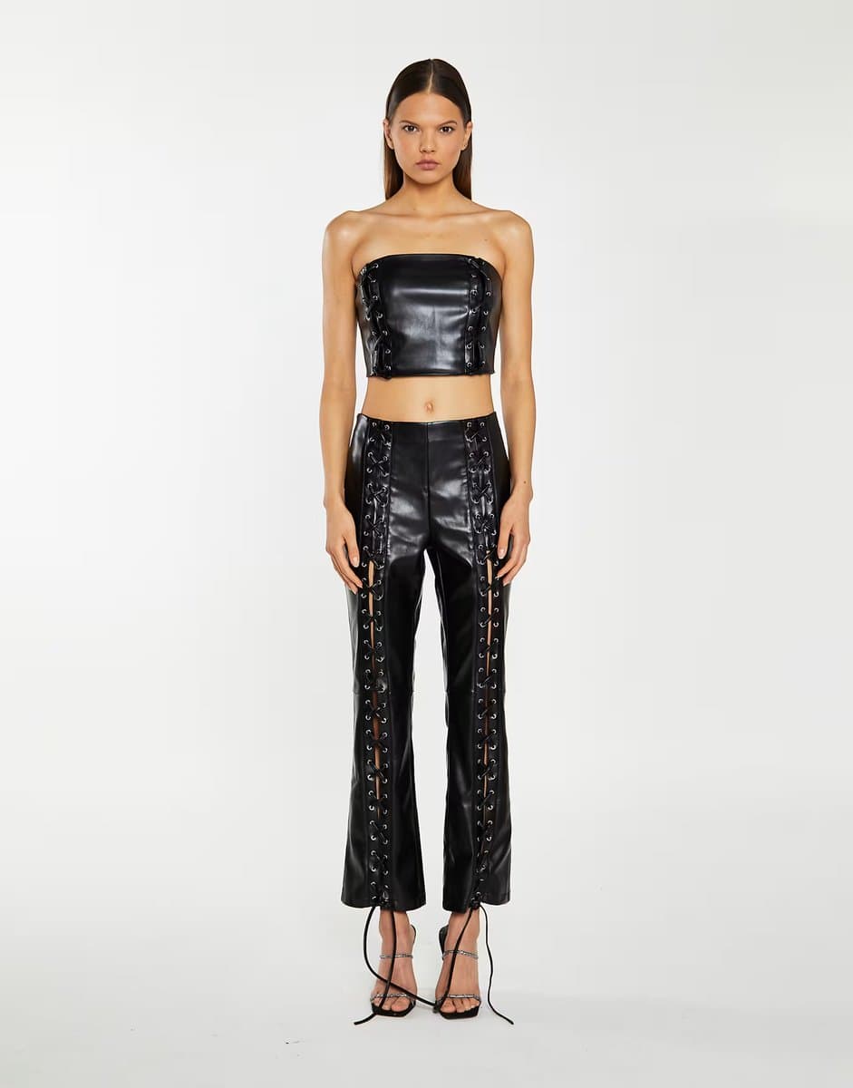 ASOS Collective The Label Low waist trousers with statement lace-up detail in black pu