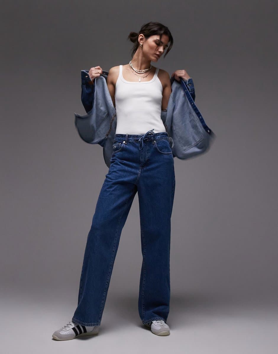 ASOS Lacoste co-ord baggy fit denim jeans in midwash blue with contrast stitching