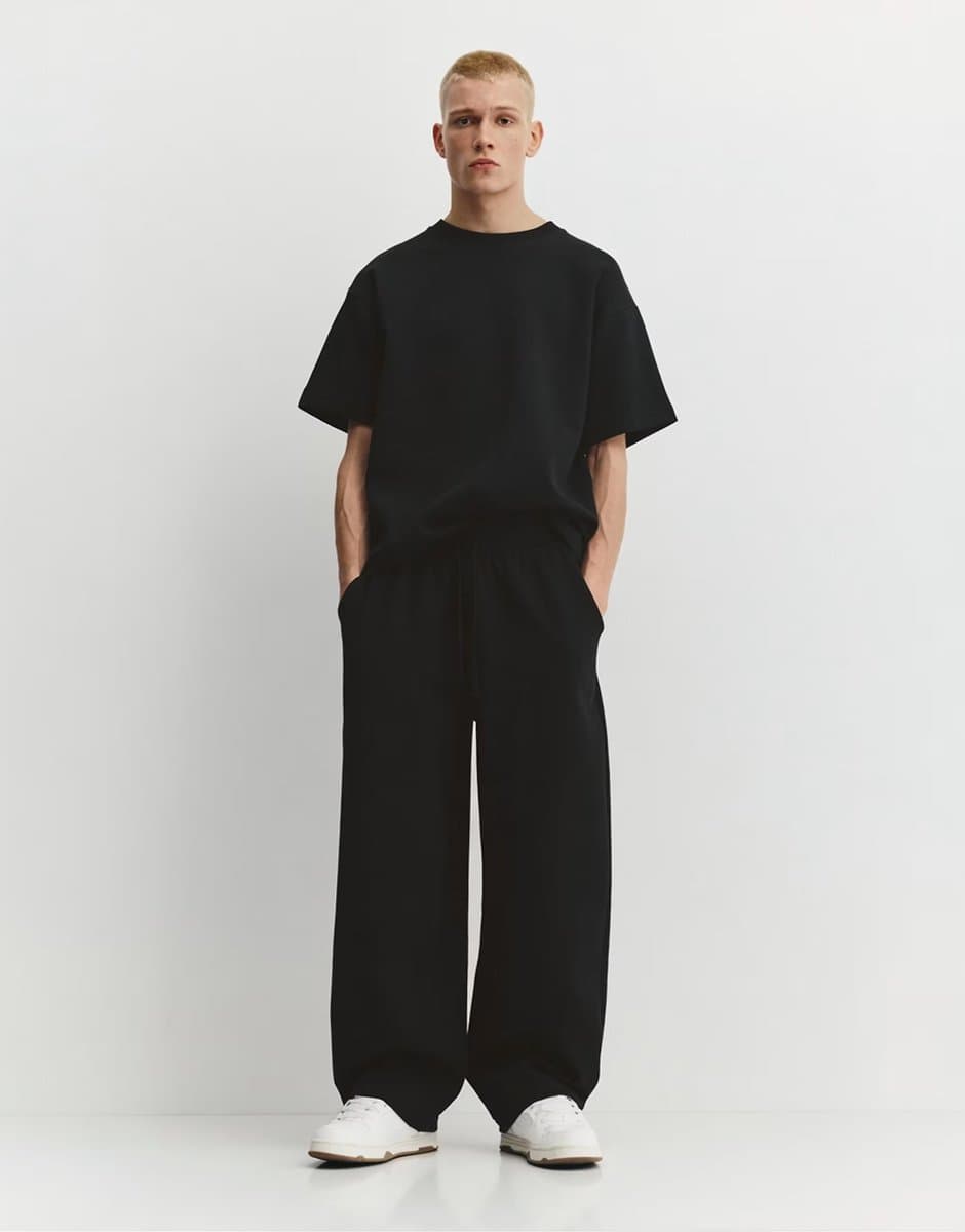 ASOS Pull&Bear Interlock balloon tracksuit bottoms in black