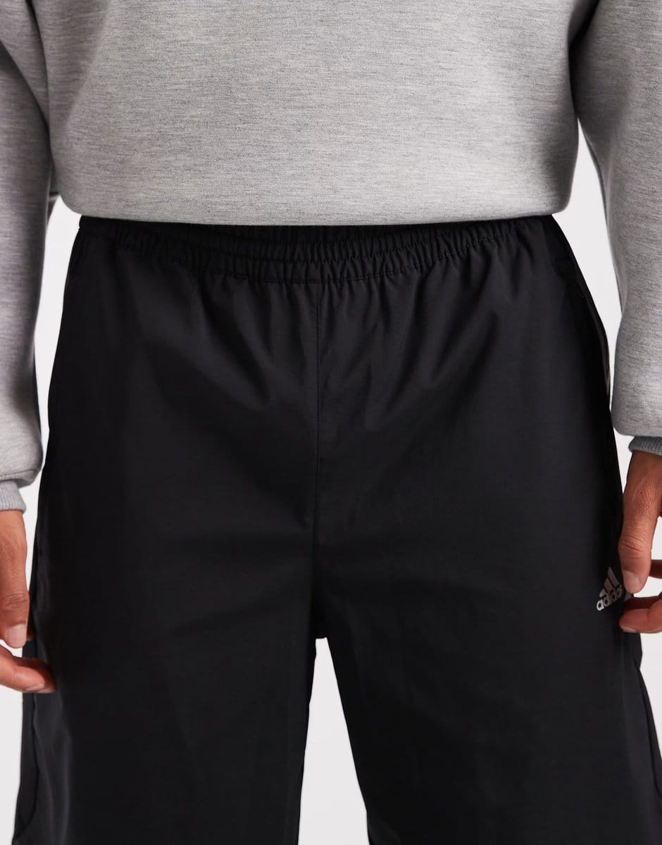 ASOS adidas Originals F50 loose striped track pants in black - 4