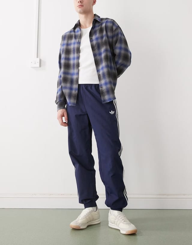 ASOS adidas Originals Firebird woven track pants in night indigo - 2