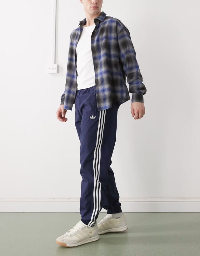 ASOS adidas Originals Firebird woven track pants in night indigo - 3