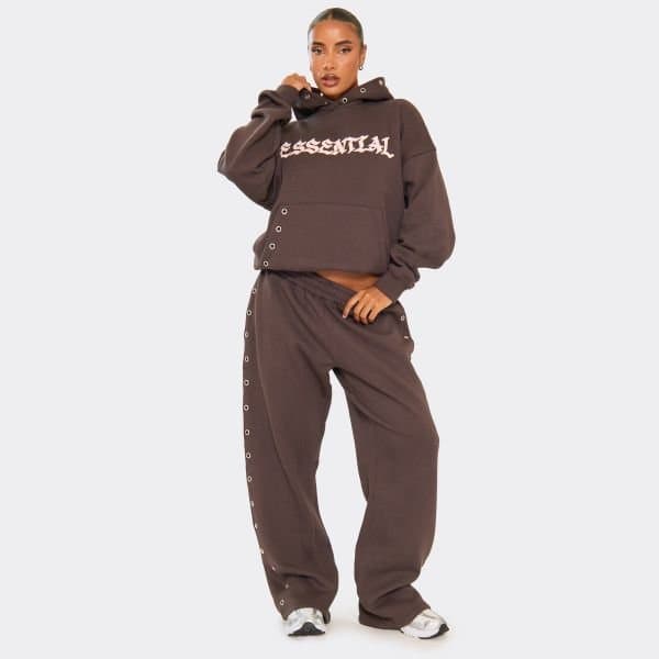 EGO Mid Rise Eyelet Detail Graphic Wide Leg Joggers In Chocolate Brown, Women's Size UK 4