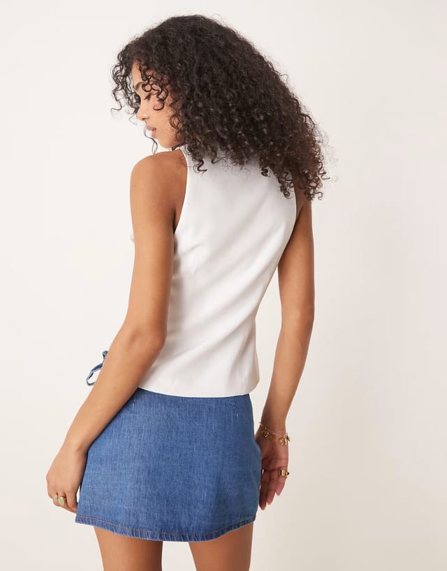 ASOS ASOS DESIGN denim wrap front mini skirt with bow detail in mid blue - 2