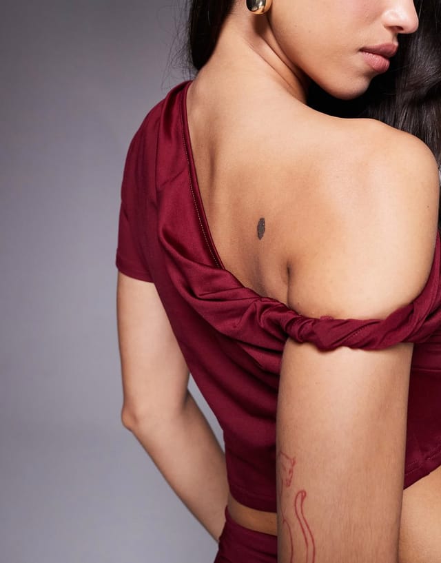 ASOS The Frolic exclusive double sculpted slinky off shoulder twist detail asymmetric crop  top co-ord in burgundy - 2