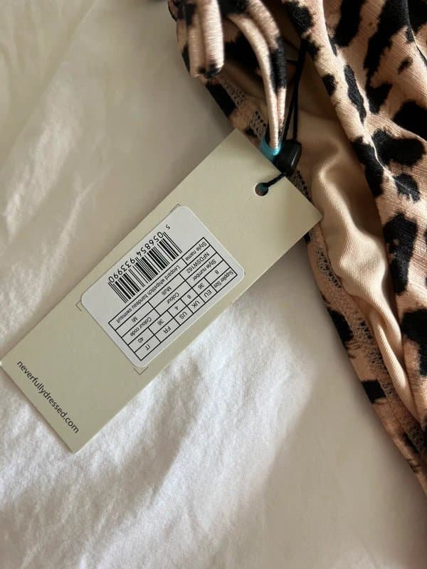 Never Fully Dressed Never fully dressed leopard print swimsuit