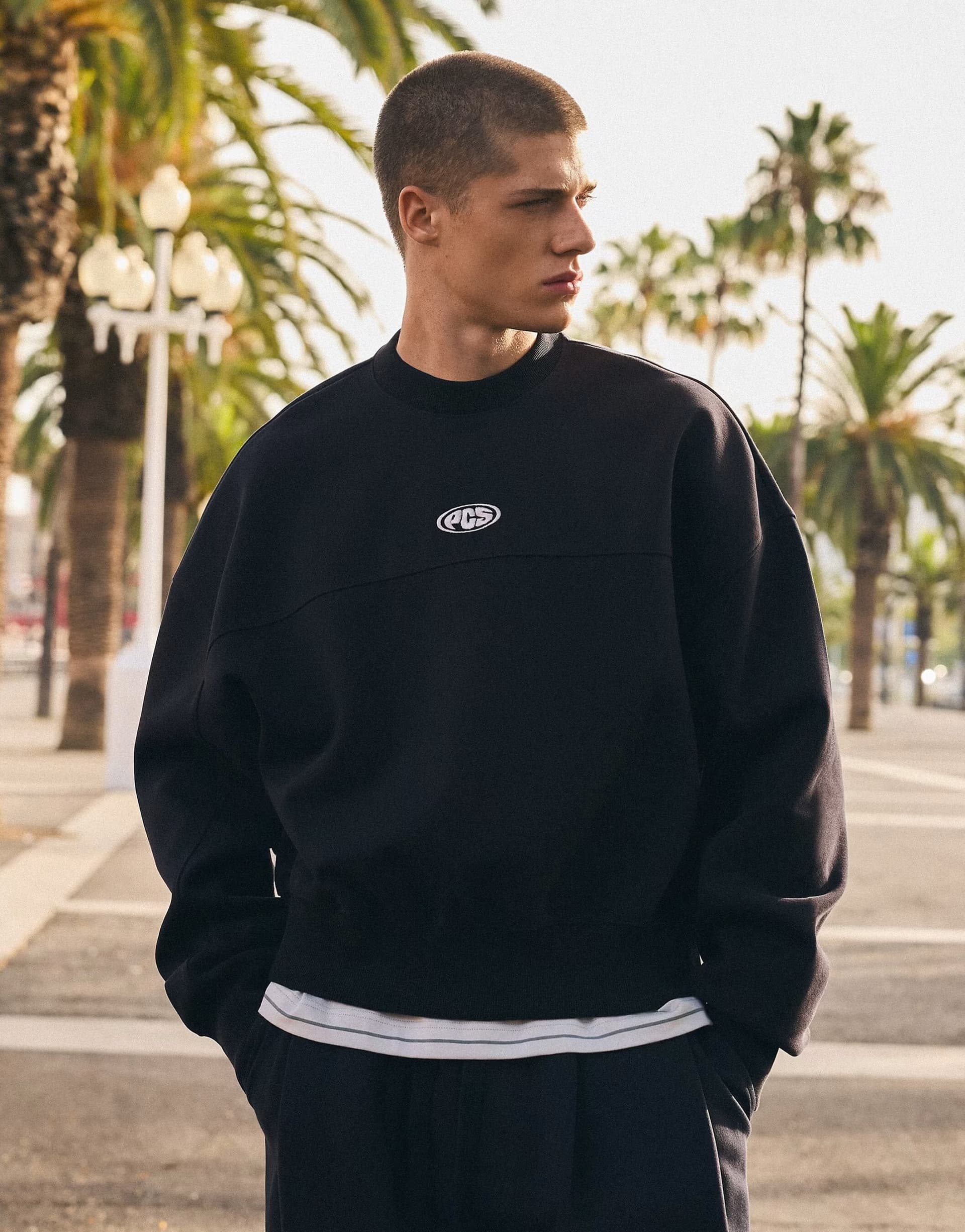 ASOS Bershka Boxy crew neck sweatshirt in blue