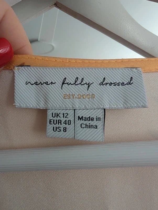 Never Fully Dressed Sun print yellow satin peplum midi dress