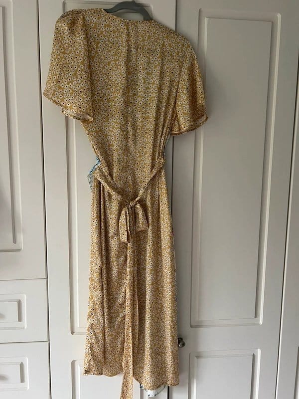 Never Fully Dressed Stunning Wrap Dress by Never Fully Dressed - 1