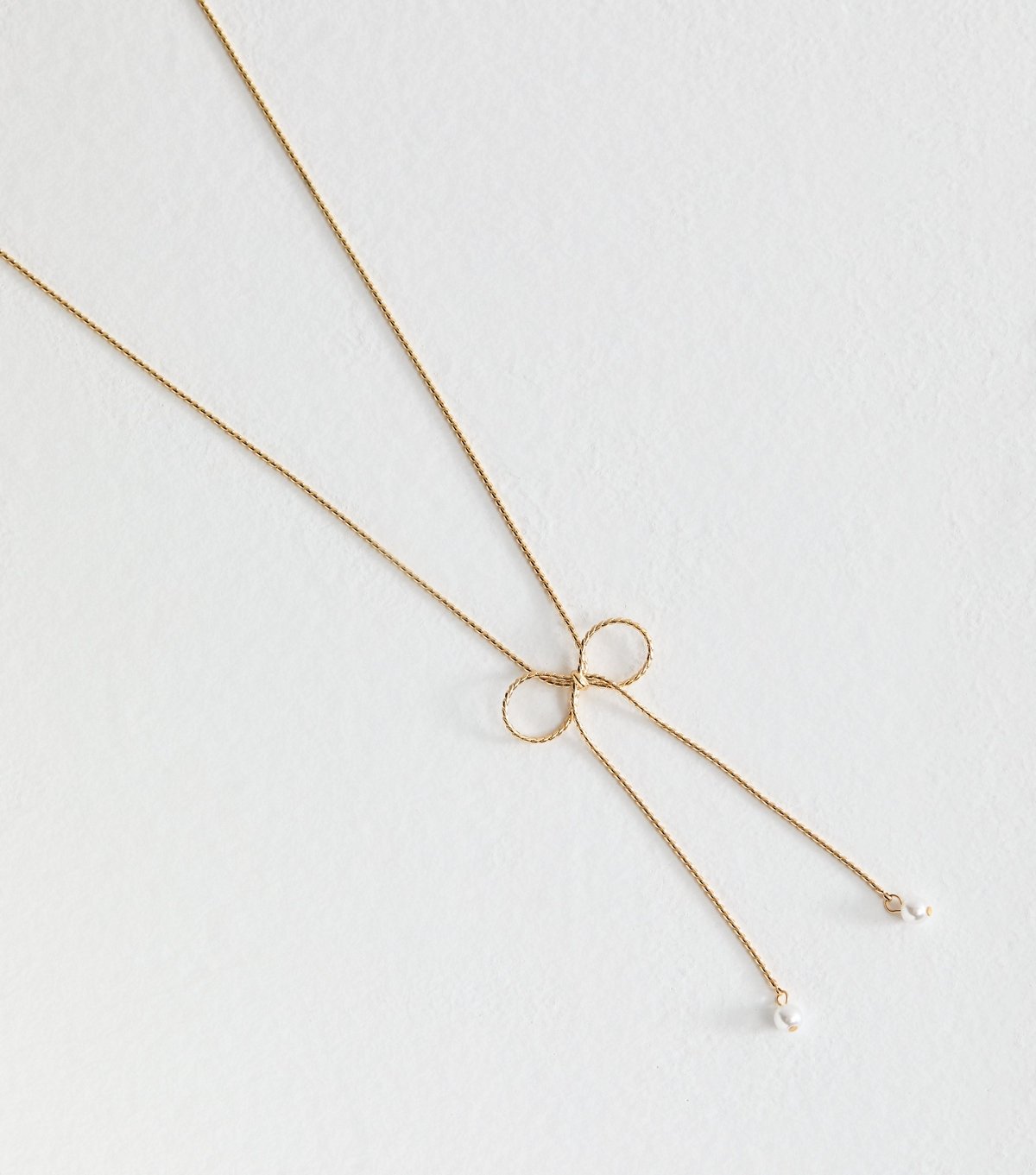 New Look Gold Tone Faux Pearl Charm Bow Long Necklace New Look - 3