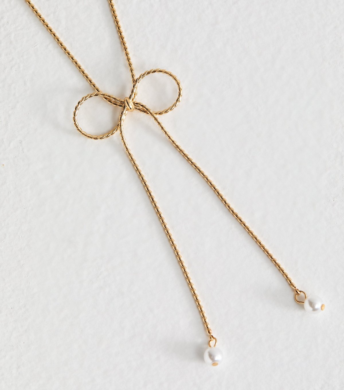 New Look Gold Tone Faux Pearl Charm Bow Long Necklace New Look - 4