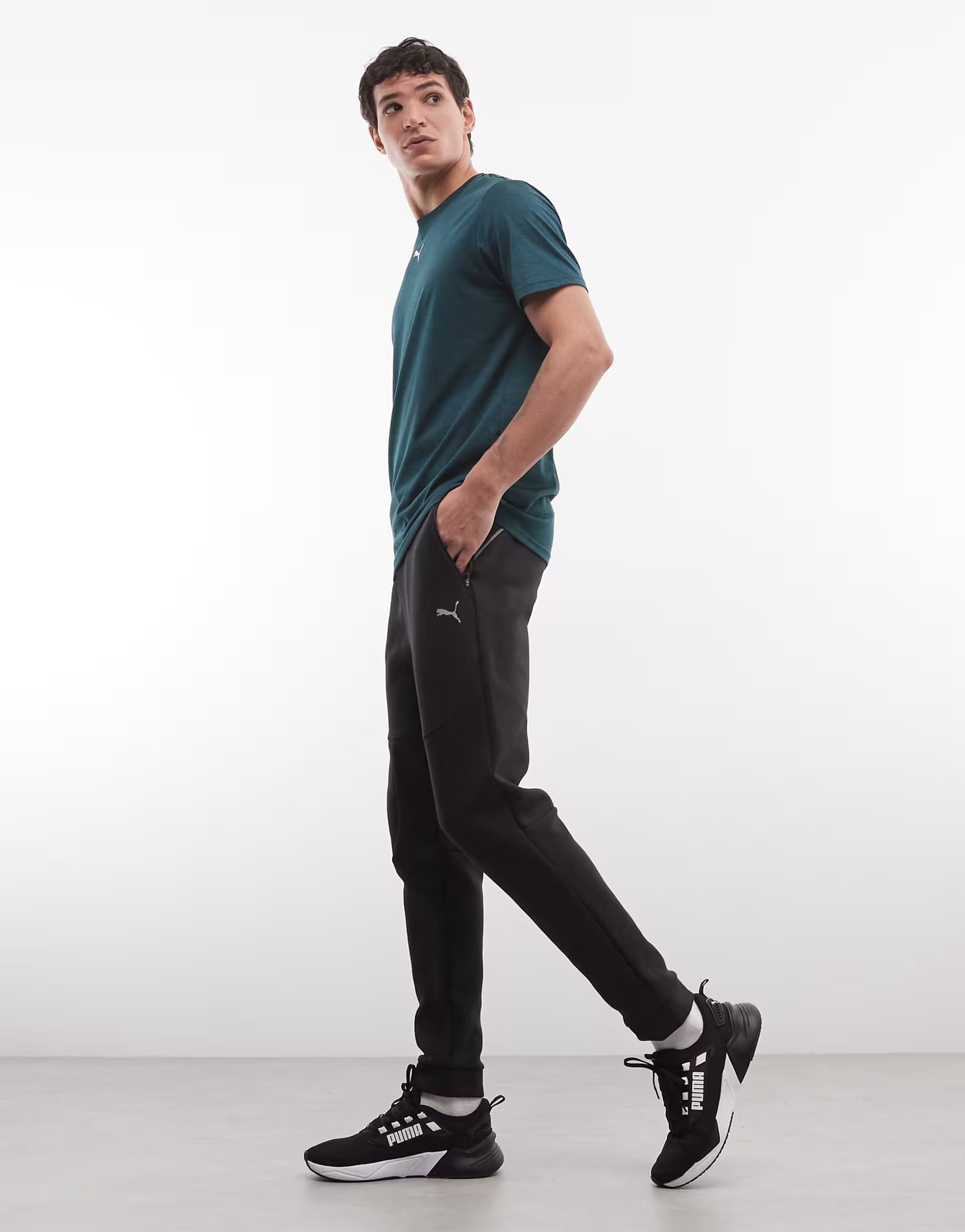 ASOS Puma Pumatech sweatpants in black