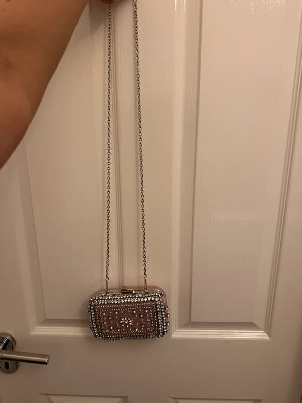 New Look Pink clutch bag with silver and pearl design