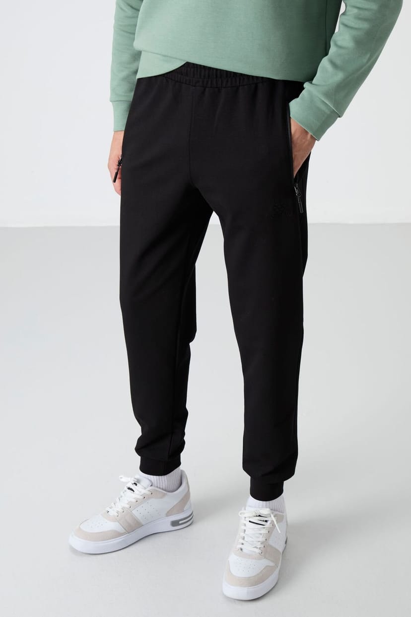 Tommy Life Tommy Life Men's Solid Pull-on Sweatpants With Zip Pocket in Black - 1