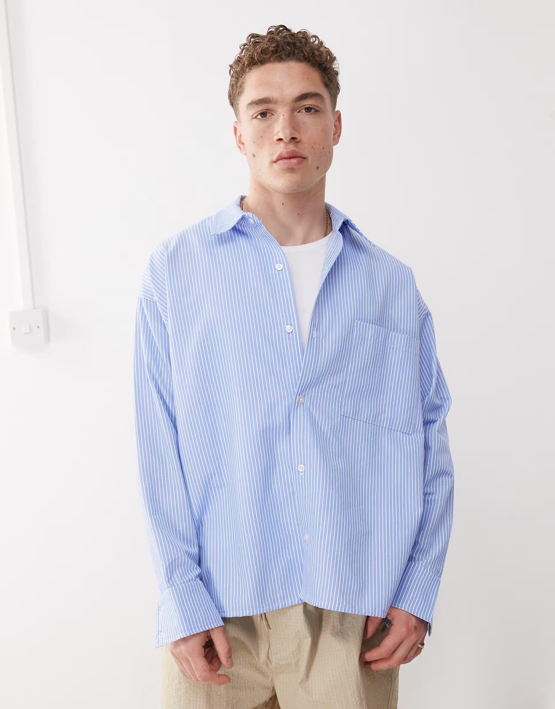 ASOS Reclaimed Vintage long sleeve crop boxy shirt in blue and white pinstripe