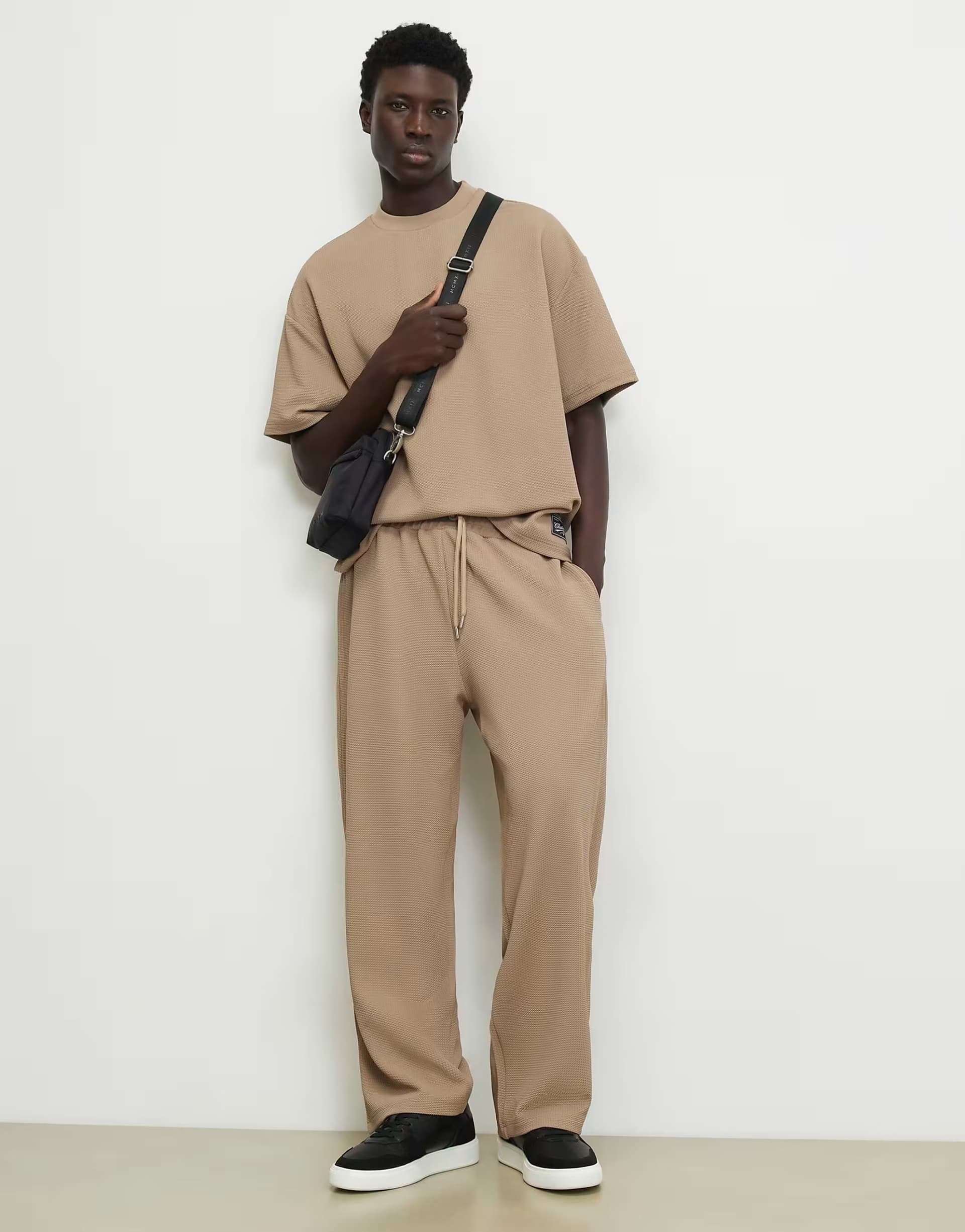ASOS River Island Wide leg waffle textured joggers in stone