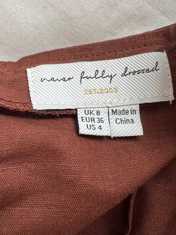 Never Fully Dressed Never Fully Dressed chocolate brown off the shoulder halter mini dress (size 8)
