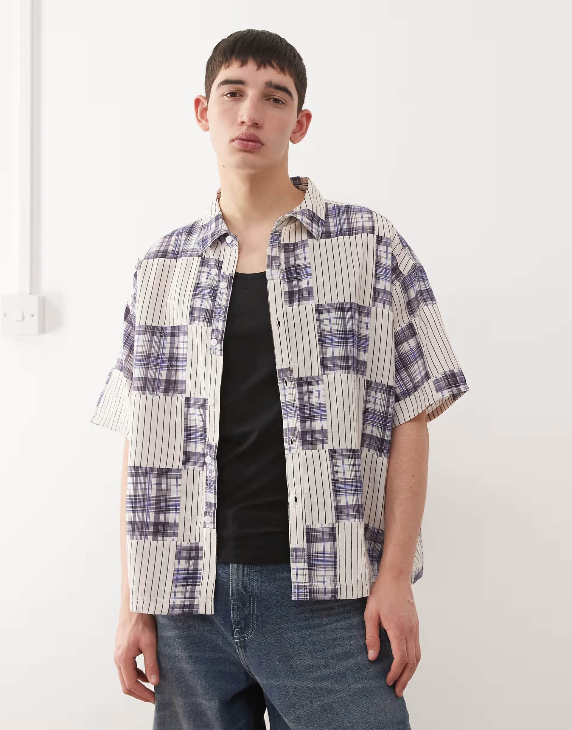 ASOS Reclaimed Vintage short sleeve boxy shirt with spliced stripe and check