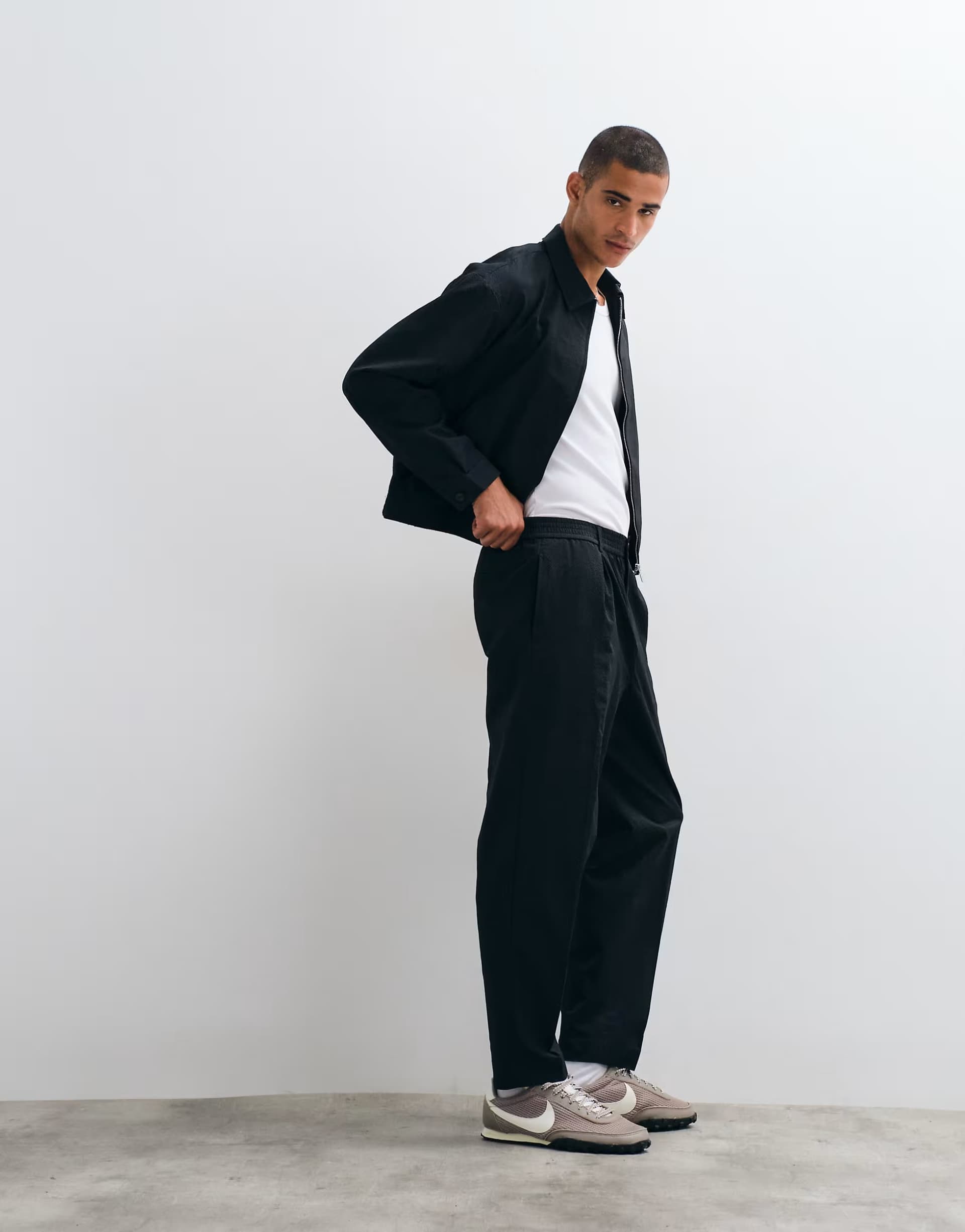 ASOS ASOS DESIGN smart co-ord carrot fit trousers in black seersucker