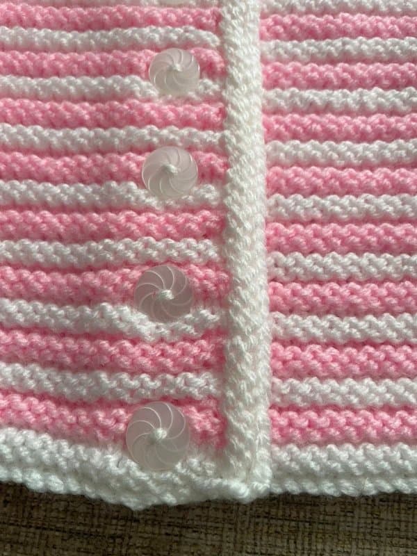 woolcornercrafts Handknitted pink /white cardigan 0-6months