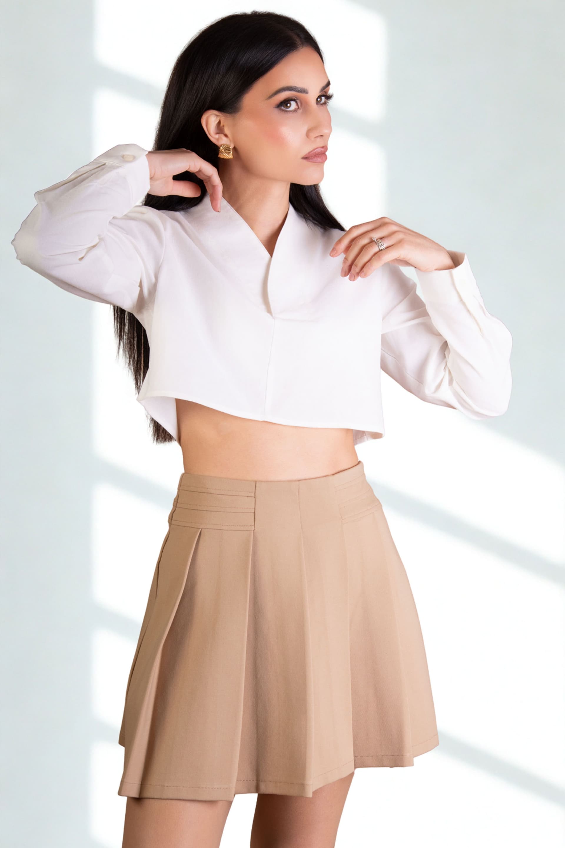 BALOU BALOU Women's High Waist Pleated Mini Skirt in Nude