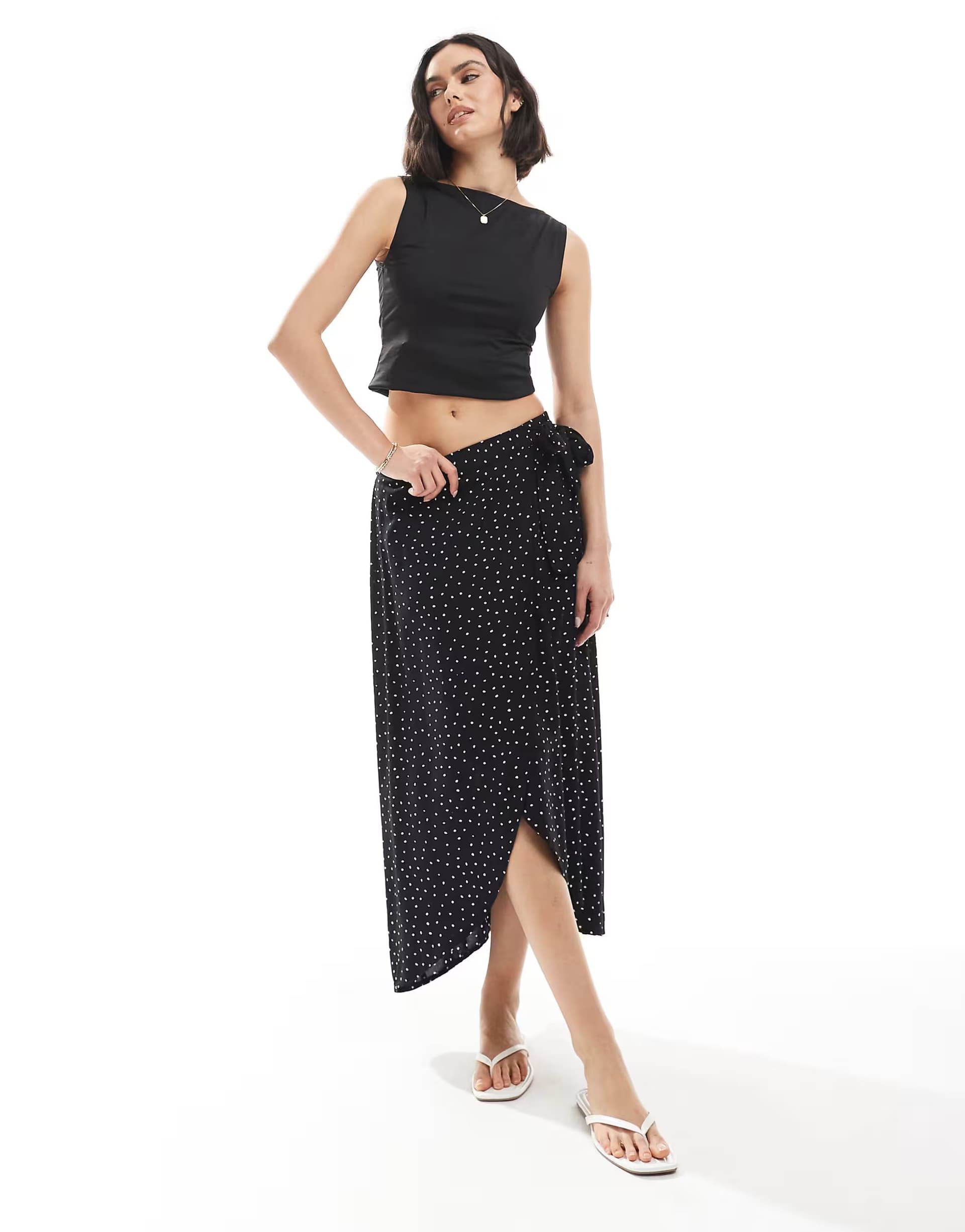 ASOS Pieces wrap midi skirt in black spot print
