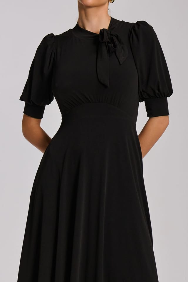 Jolie Moi Jolie Moi Women's Tie Neck Puffy Sleeve Jersey Midi Dress in Black - 3