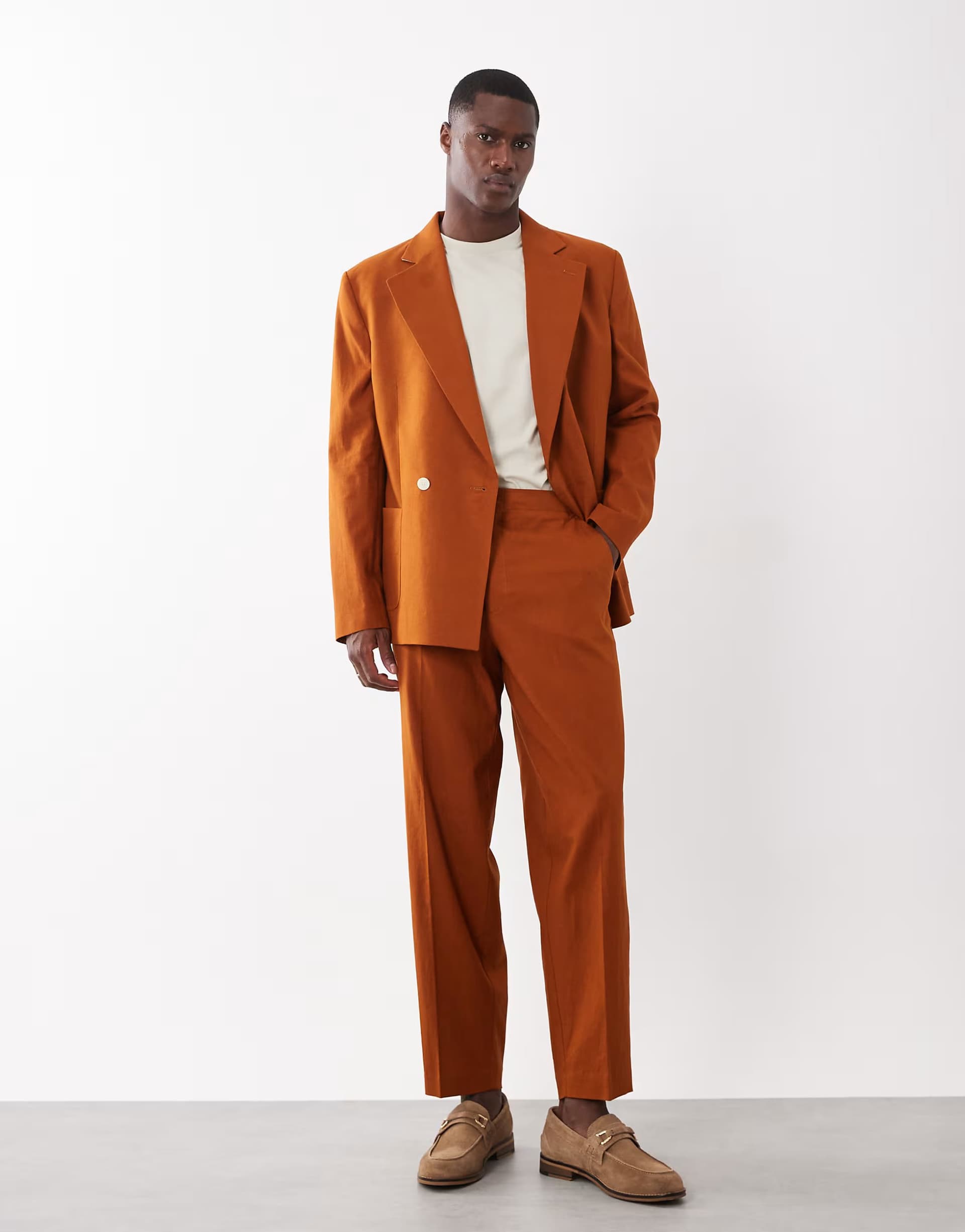 ASOS ASOS DESIGN oversized tapered suit trousers in rust orange with linen