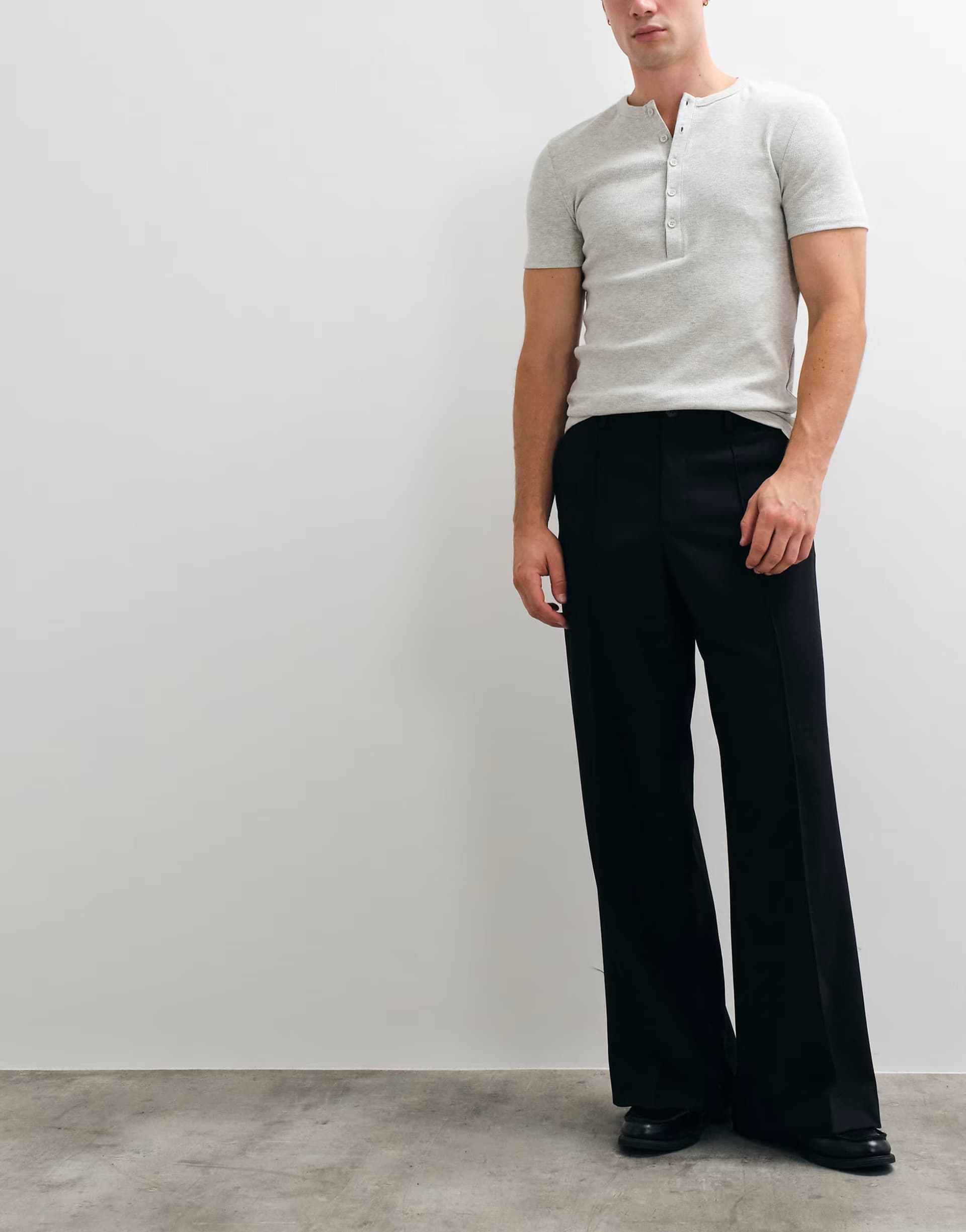 ASOS ASOS DESIGN tailored loose leg trousers in black with pintuck