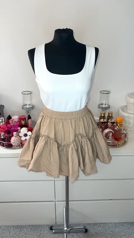 New Look Beige peplum style mini skirt