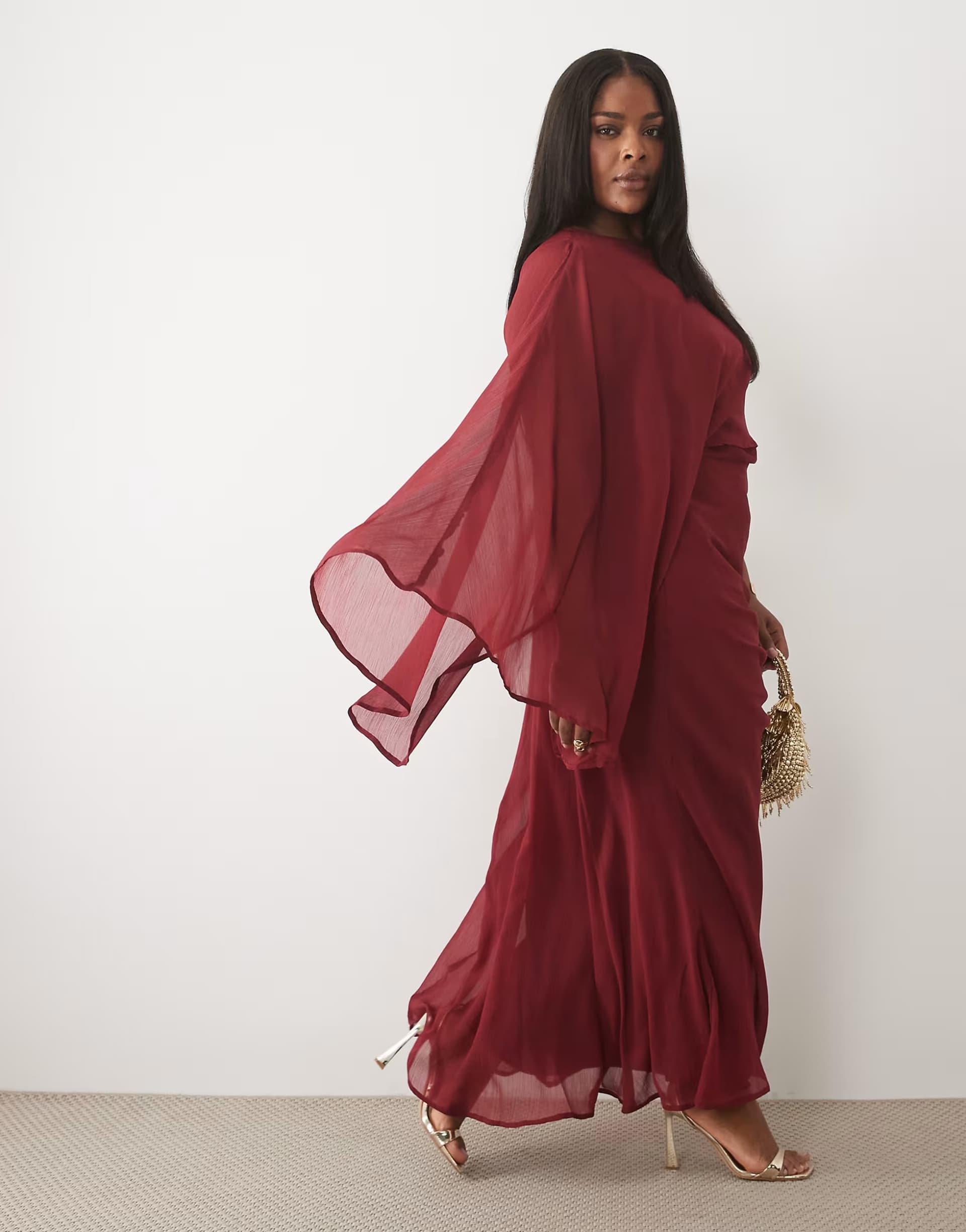 ASOS ASOS DESIGN Curve draped batwing asymmetric one sleeve maxi dress in burgundy