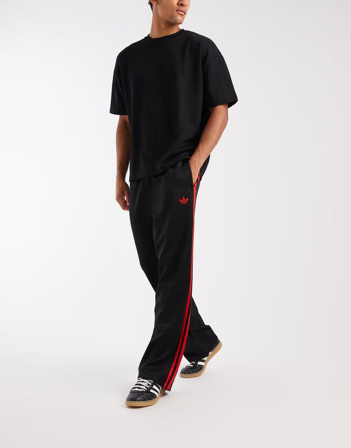 ASOS adidas Originals Adicolor loose trackpants in black / vivid red - 1