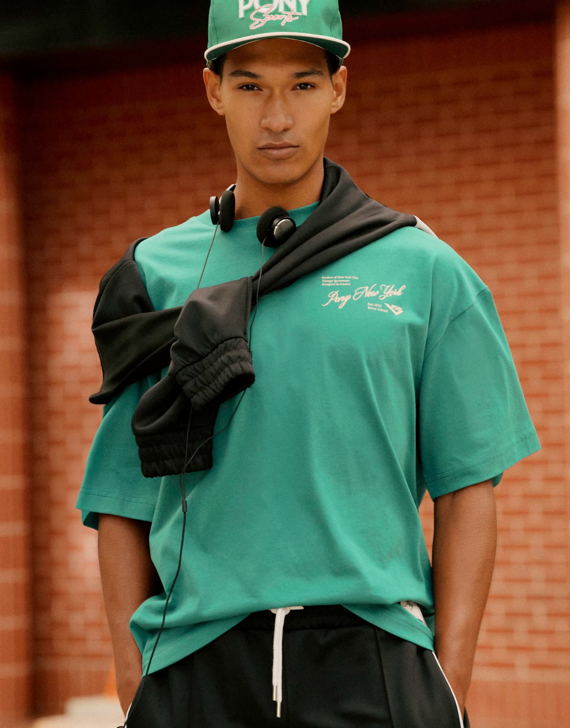 ASOS River Island Oversized script embroidered t-shirt in green