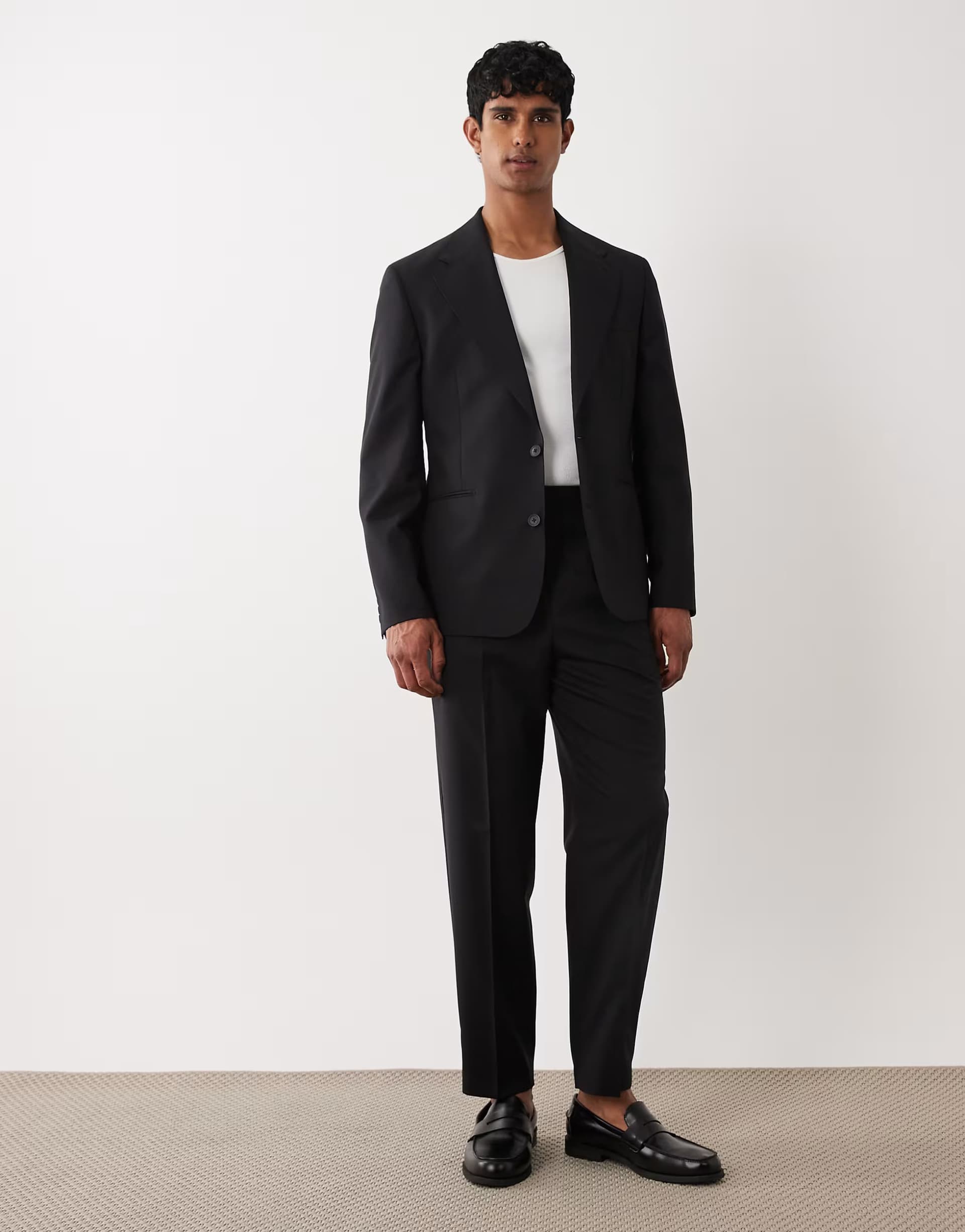 ASOS ASOS DESIGN premium relaxed tapered suit trousers in black wool