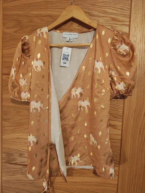Never Fully Dressed Never Fully Dressed Wrap Top - Gold with foil and elephant design - size 8