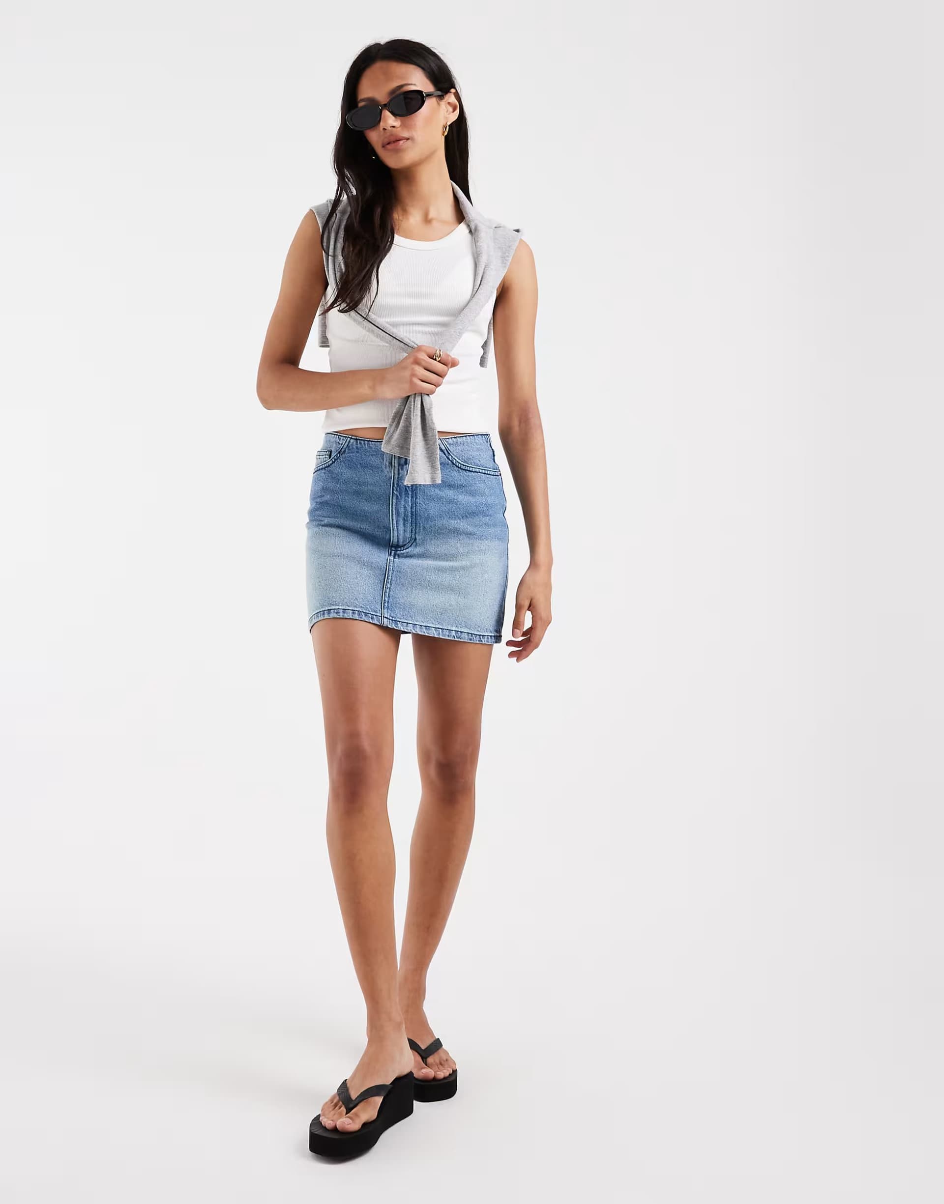 ASOS ASOS DESIGN denim low rise mini skirt with no waistband in vintage mid wash
