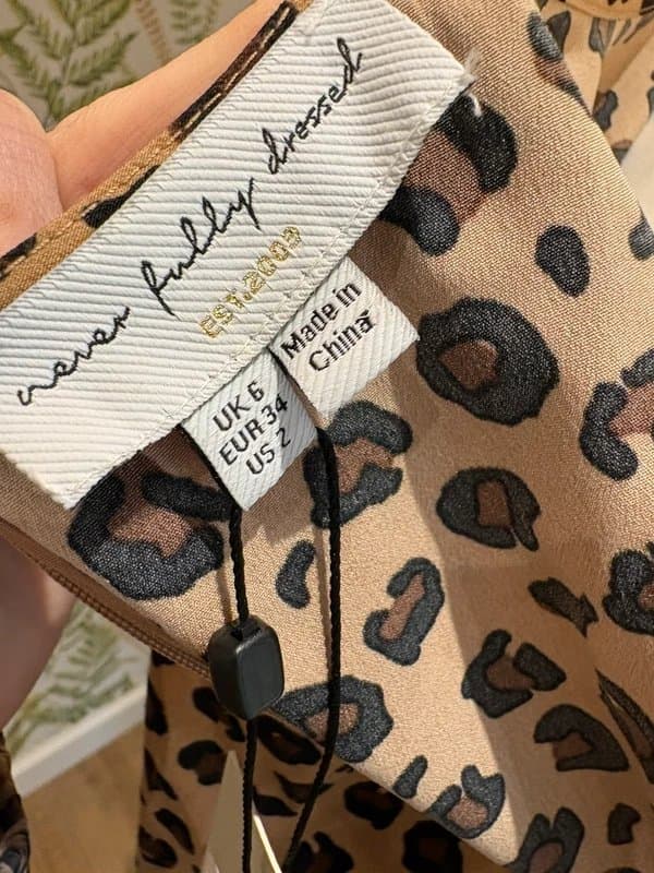 Never Fully Dressed Never Fully Dressed size 6 BNWT Mini  Dress Leopard Print long sleeve