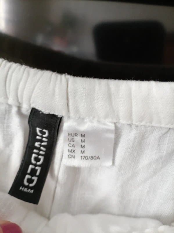 H&M Divided Ladies size medium white lightweight wide leg summer trousers