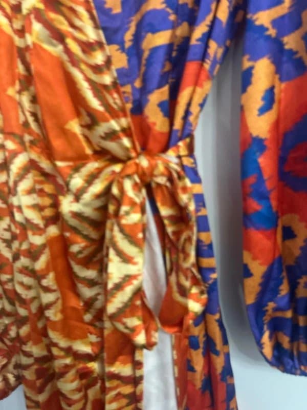 Never Fully Dressed Never fully dress wrap around dress