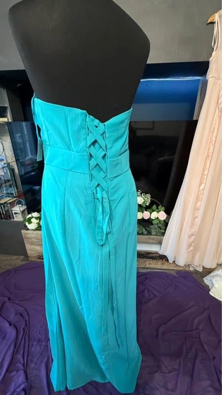 Wedding New with tags Beautiful turquoise chiffon flower detail corset back dress size 16