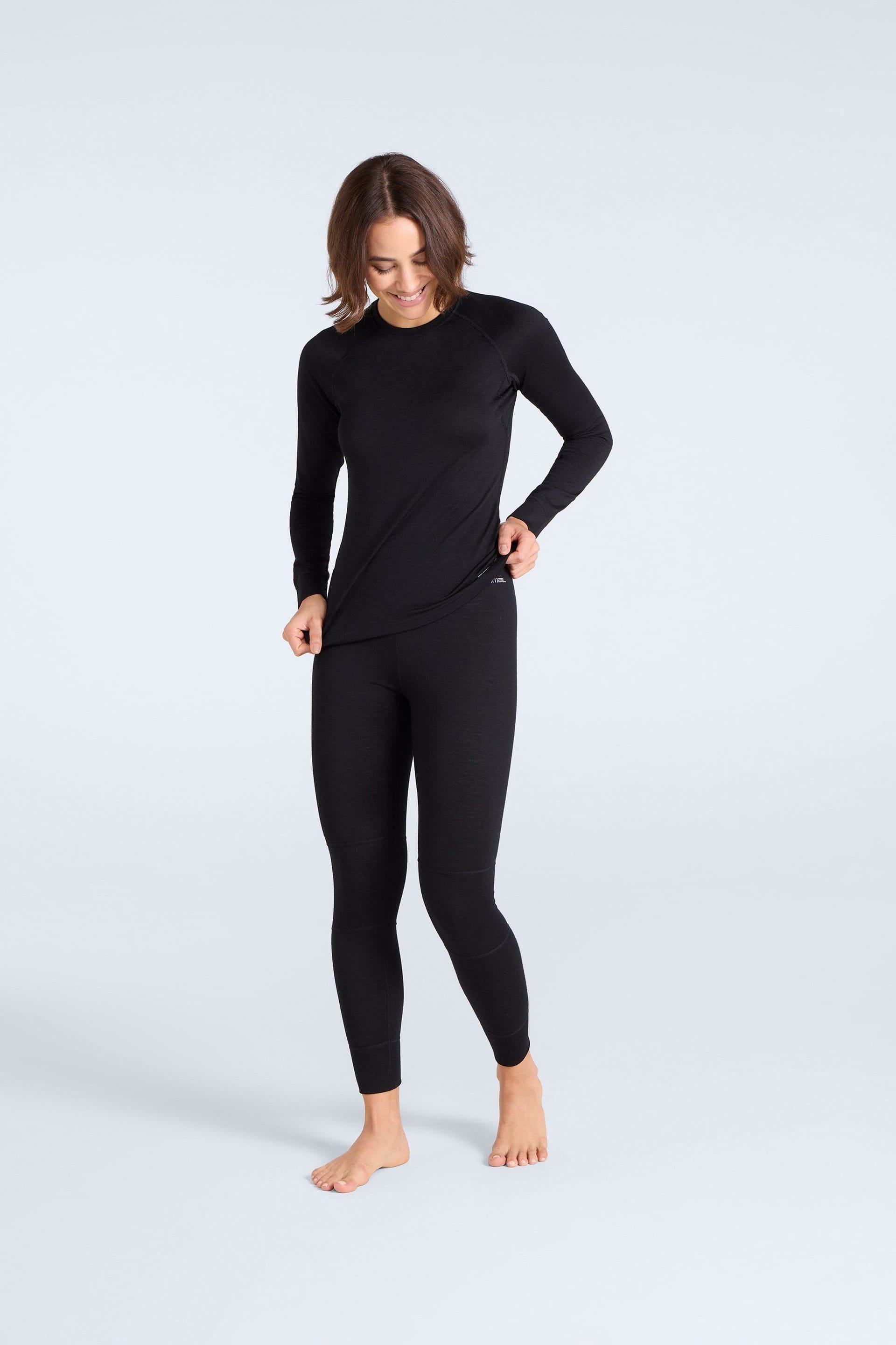 Animal Animal Women's Lightweight Breathable Soft Insulated Stretchy Merino Base Layer Pants in Black - 4